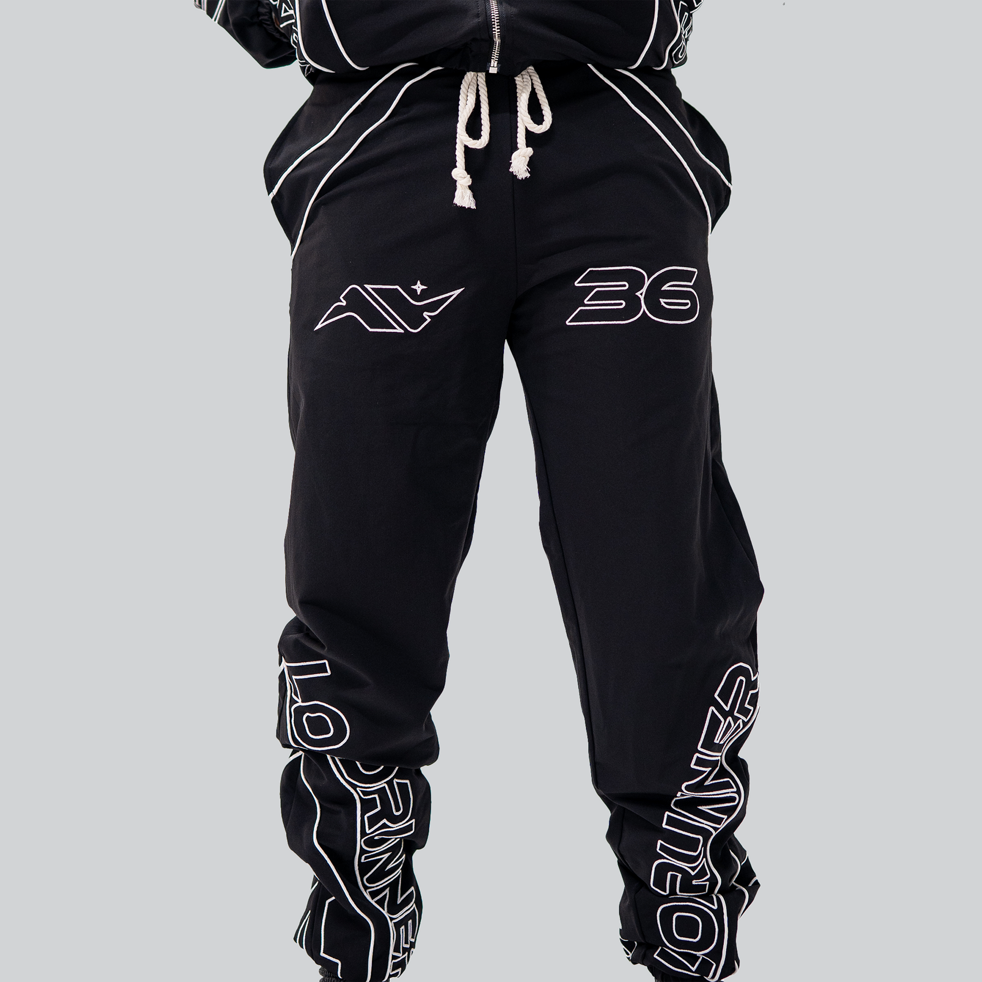 LOADRUNNER WORLDWIDE TRACK PANTS — campaign image
